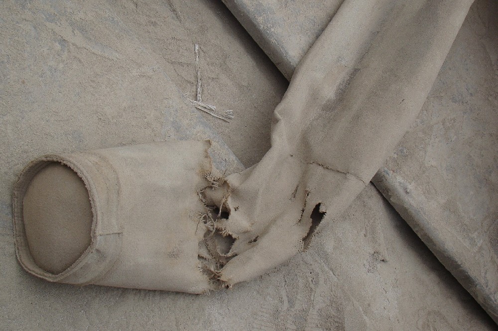 如何处理破损的除尘布袋？